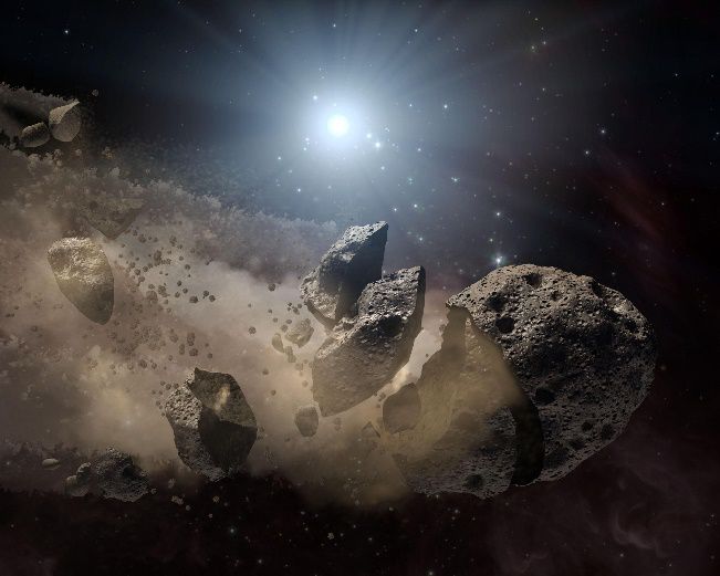 Artist impression of the breakup of a large asteroid and the creation of a family of asteroids.